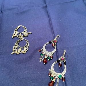 Hoop dangling earrings with small colored beads